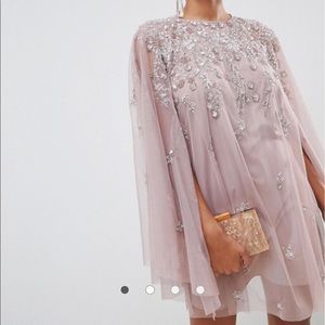 mini dress with heavily embellished cape